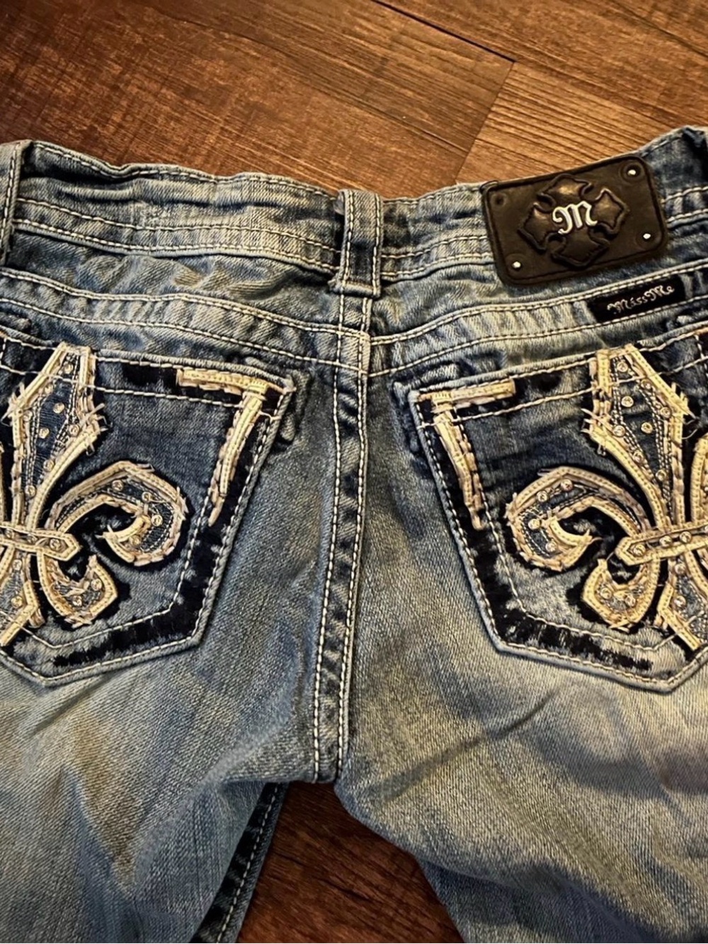 Miss Me Light Blue Boot Cut Jeans with Fleur-de-Lis Embellished Pockets